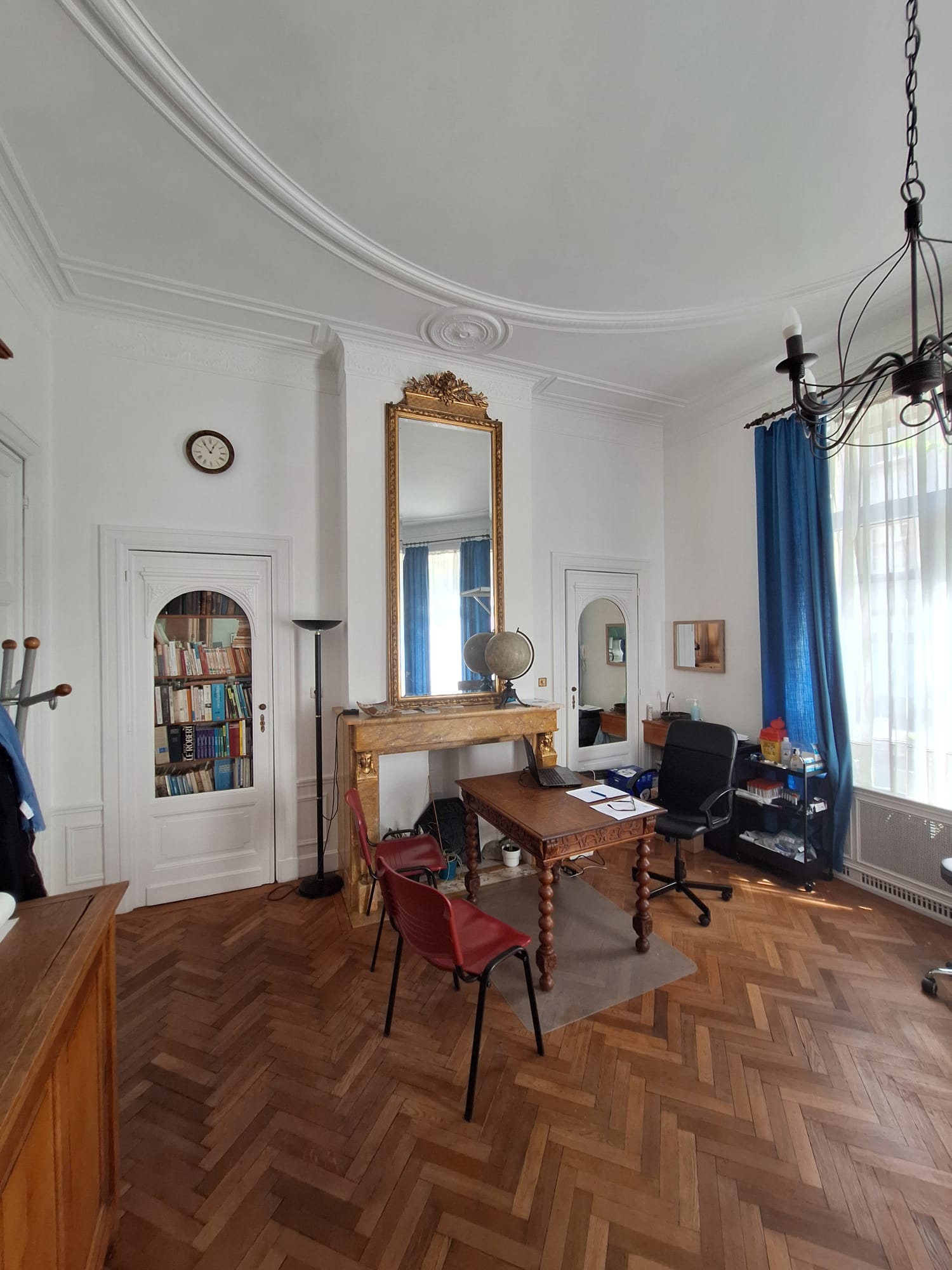 Consultation office with period mouldings and antique fireplace